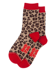 Leopard print socks with red accents and 'Sock Talk' text on a white background