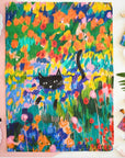 Cats in art tea towel gift present with a black cat in abstract flowers