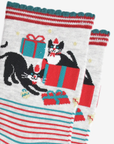 Socks with tuxedo cats and gift boxes design on a white background