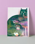 A cat greeting card with a colourful illustration of a cat blending various artistic styles, standing against a pink background.