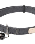 Gray cat collar with a black bell and beige label on a white background