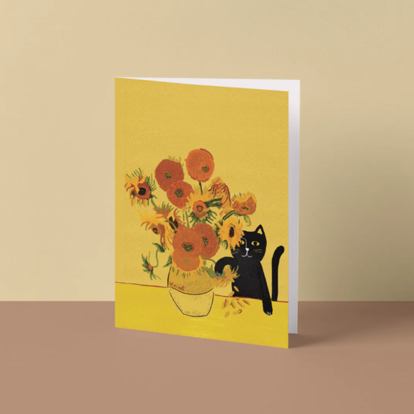 Greeting card with sunflowers and a black cat on a yellow background
