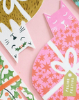 Collection of festive greeting cards with cat designs and 'Feline Festive' text.