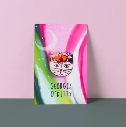 Can pin badge with a funky designed card background