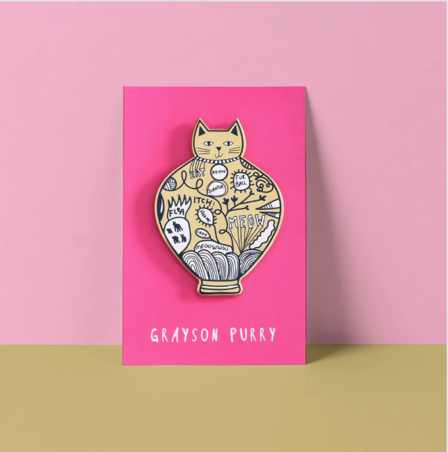 Decorative cat illustration on a pink card with &#39;Grayson Purry&#39; branding.