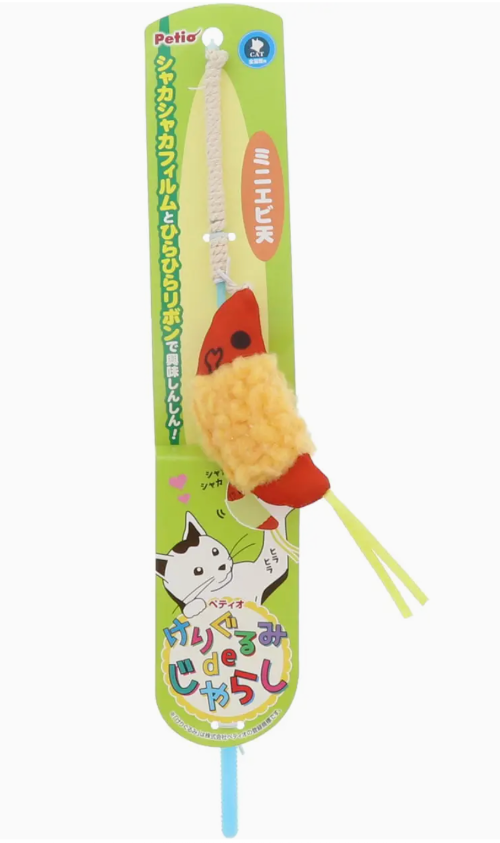 Pet toy with a cat design on a green background